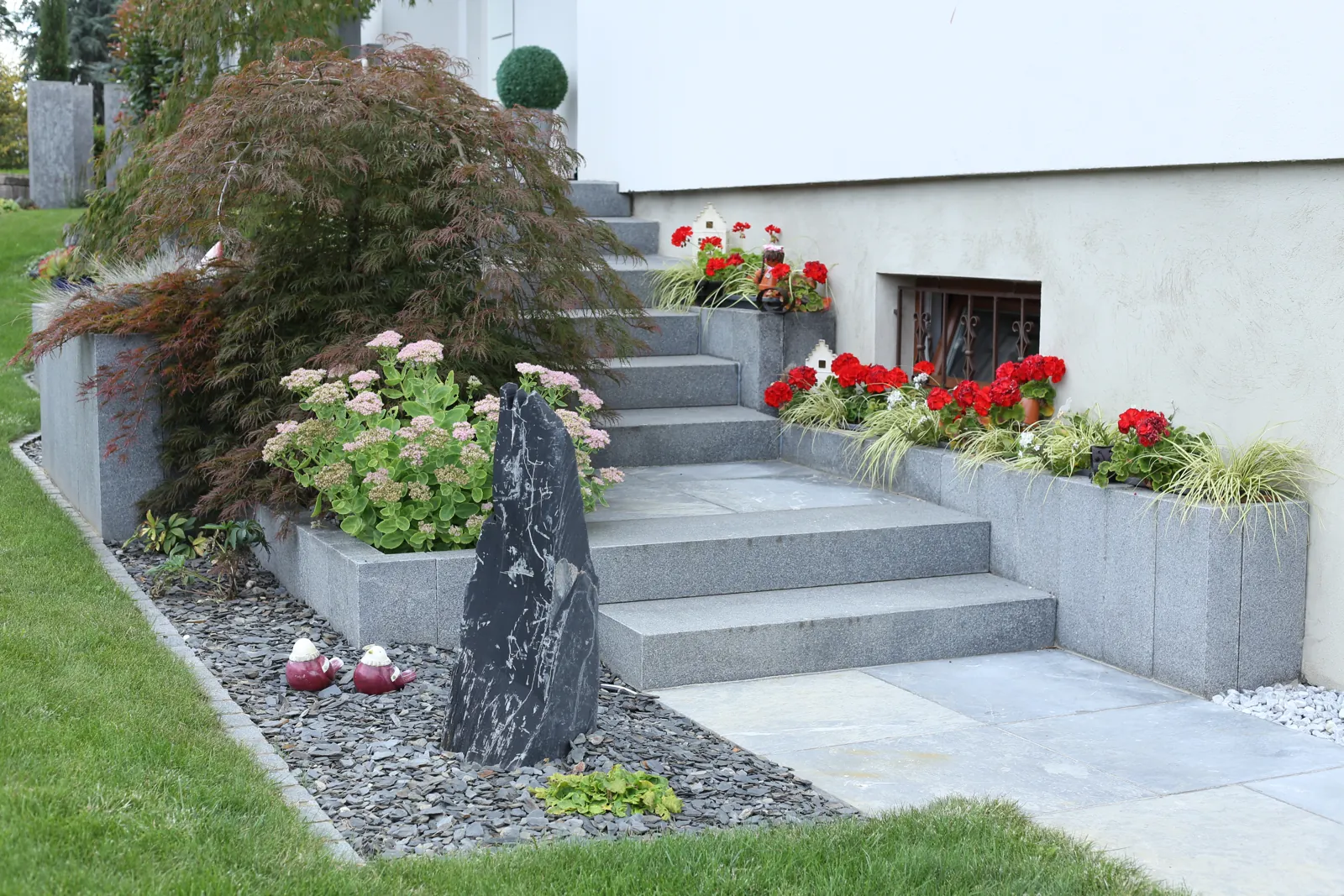 tom pousse paysage réfection entrée marche bloc granit palissades après 2
