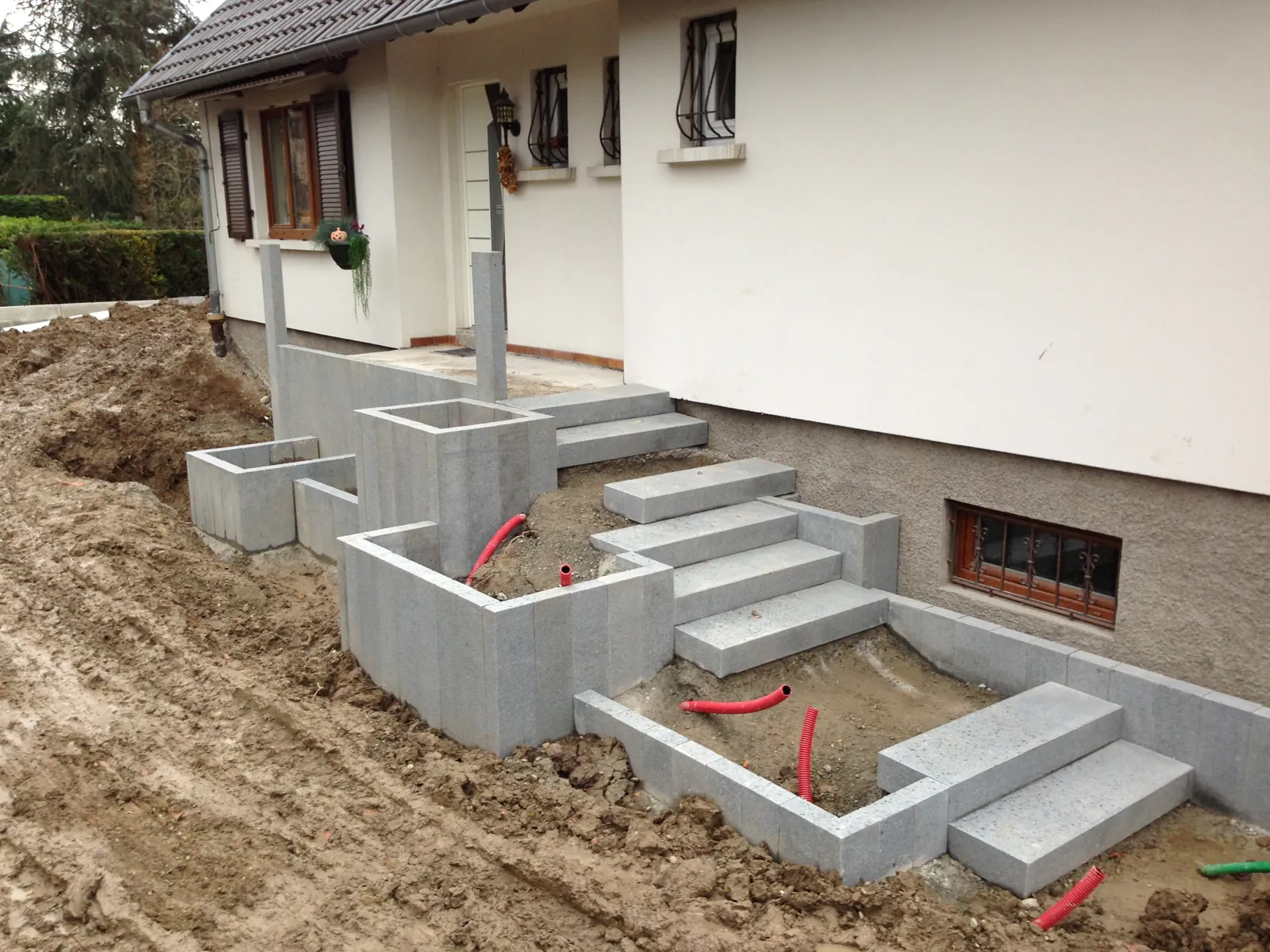 tom pousse paysage réfection entrée marche bloc granit palissades pendant 1